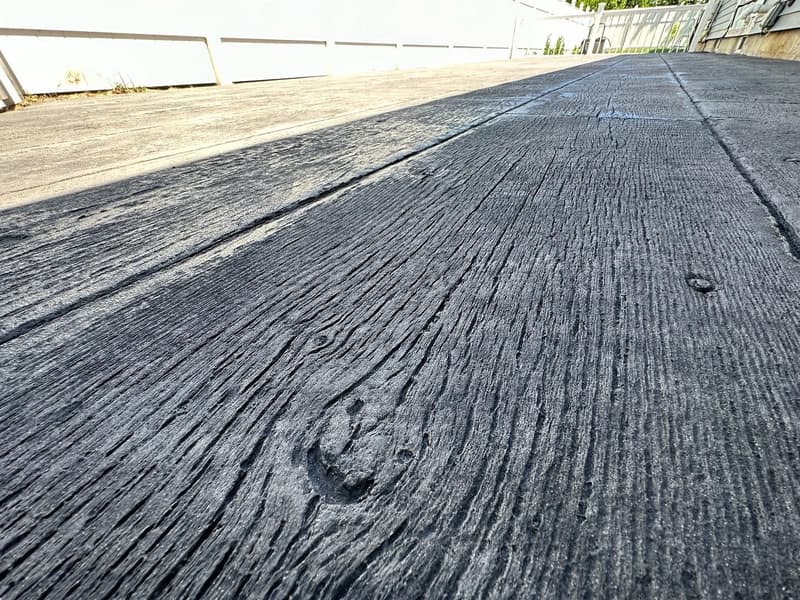 Wood plank stamped concrete texture